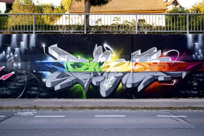 Grey and Colorful Stylewriting by FOKUS.81. This Graffiti is located in München, Germany and was created in 2020. This Graffiti can be described as Stylewriting, Characters and Wall of Fame.