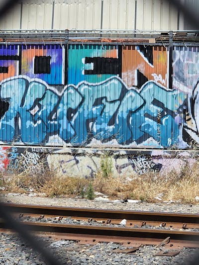Light Blue Stylewriting by Kufue. This Graffiti is located in United States and was created in 2022. This Graffiti can be described as Stylewriting and Line Bombing.