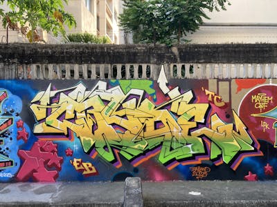 Colorful and Yellow Stylewriting by Crude. This Graffiti is located in Bangkok, Thailand and was created in 2023.