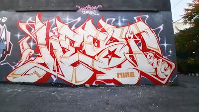 Red and Beige Stylewriting by Hest1. This Graffiti is located in MONTREAL, Canada and was created in 2024. This Graffiti can be described as Stylewriting and Wall of Fame.