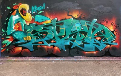 Cyan and Colorful Stylewriting by split and argh. This Graffiti is located in Germany and was created in 2021. This Graffiti can be described as Stylewriting, Characters and Wall of Fame.