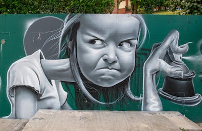 Grey and Cyan Characters by Nexgraff. This Graffiti is located in donostia, Spain and was created in 2021. This Graffiti can be described as Characters, Murals and 3D.