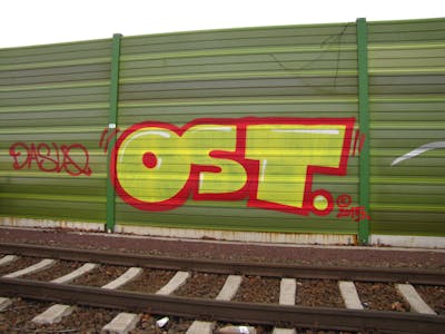 Yellow and Red Stylewriting by urine, mobar, Pizar and OST. This Graffiti is located in Leipzig, Germany and was created in 2016. This Graffiti can be described as Stylewriting and Line Bombing.