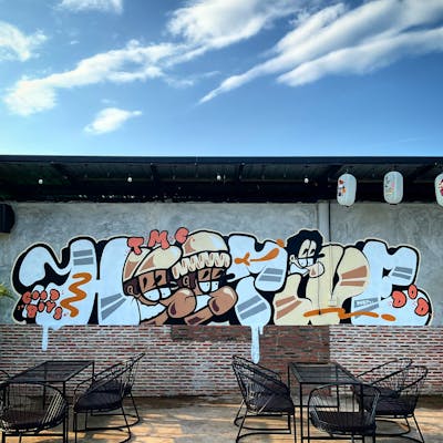 Grey and Beige and Brown Stylewriting by Hootive. This Graffiti is located in Thailand and was created in 2023. This Graffiti can be described as Stylewriting and Characters.
