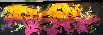 Coralle and Orange Stylewriting by WOS ONE. This Graffiti is located in Offenburg, Germany and was created in 2021.
