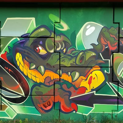 Colorful and Green Characters by tempz. This Graffiti is located in lublin, Poland and was created in 2021. This Graffiti can be described as Characters and Wall of Fame.