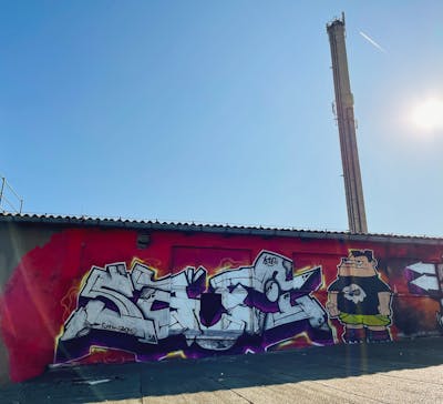 Chrome and Red and Colorful Stylewriting by Safi. This Graffiti is located in Germany and was created in 2023. This Graffiti can be described as Stylewriting, Characters and Abandoned.