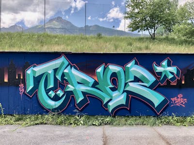 Cyan and Blue Stylewriting by TROZ ONE. This Graffiti is located in Imst, Austria and was created in 2022. This Graffiti can be described as Stylewriting and Wall of Fame.