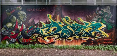 Colorful and Cyan Stylewriting by Nikt and Mois. This Graffiti is located in Kiel, Germany and was created in 2021. This Graffiti can be described as Stylewriting and Characters.