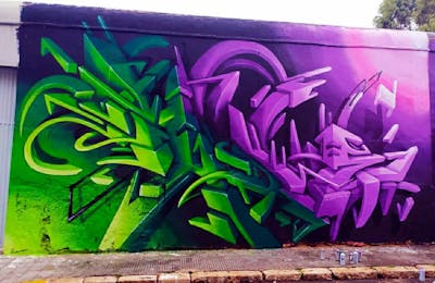 Violet and Green Stylewriting by Rudi and Rudiart. This Graffiti was created in 2020 but its location is unknown. This Graffiti can be described as Stylewriting and 3D.