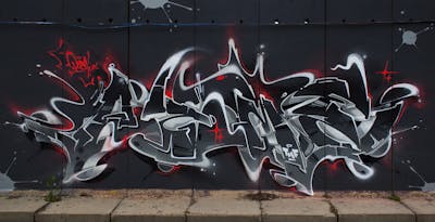 Grey and Black and Red Stylewriting by AZME and Posa. This Graffiti is located in Chemnitz, Germany and was created in 2021.