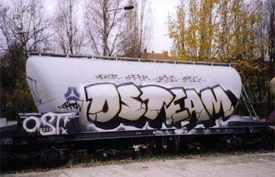 Chrome and Black Trains by urine, OST, Dreck, kafor and Mekor. This Graffiti is located in Berlin, Germany and was created in 2005. This Graffiti can be described as Trains, Stylewriting and Street Bombing.