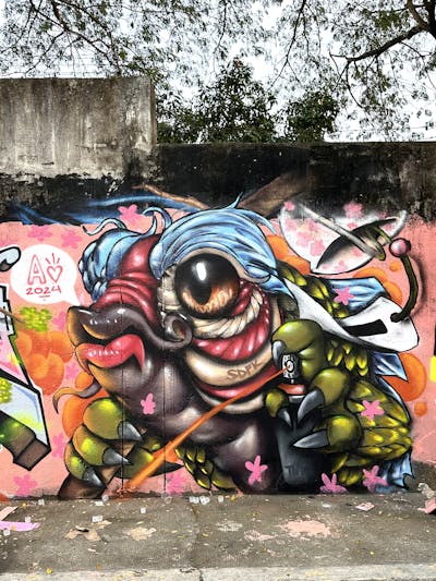 Colorful Characters by SWL, Love.r and SDFK. This Graffiti is located in Makati, Philippines and was created in 2024. This Graffiti can be described as Characters and Streetart.
