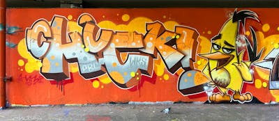 Orange and Grey and Yellow Stylewriting by HAMPI, BISTE and CHUCK. This Graffiti is located in Rheine, Germany and was created in 2023. This Graffiti can be described as Stylewriting and Characters.