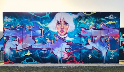 Colorful and Light Blue Stylewriting by Emty and Dot. This Graffiti is located in Wiesbaden, Germany and was created in 2021. This Graffiti can be described as Stylewriting, Characters and Wall of Fame.