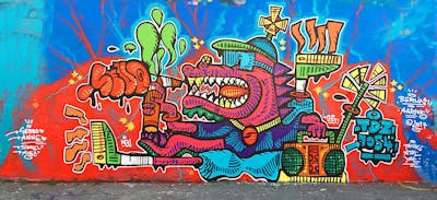 Colorful Characters by Hülpman and OST. This Graffiti is located in Arhus, Denmark and was created in 2017.
