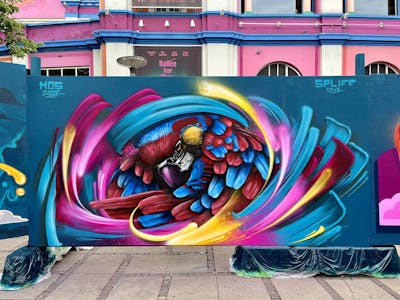Colorful Characters by spliff one. This Graffiti is located in copenhagen, Denmark and was created in 2022. This Graffiti can be described as Characters and Futuristic.