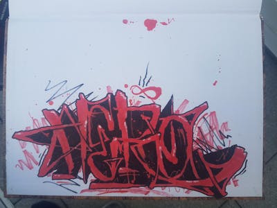 Red and Black Blackbook by Hero one. This Graffiti is located in Germany and was created in 2023. This Graffiti can be described as Blackbook.