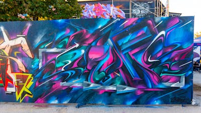 Colorful Stylewriting by SNUZ. This Graffiti is located in Thessaloniki, Greece and was created in 2022. This Graffiti can be described as Stylewriting, Futuristic and Wall of Fame.