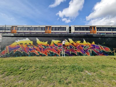 Colorful Stylewriting by Techno, CAS and PAB. This Graffiti is located in London, United Kingdom and was created in 2023. This Graffiti can be described as Stylewriting and Line Bombing.