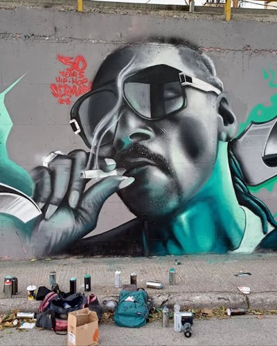 Grey and Cyan Characters by serman. This Graffiti is located in Katerini, Greece and was created in 2024. This Graffiti can be described as Characters and Streetart.
