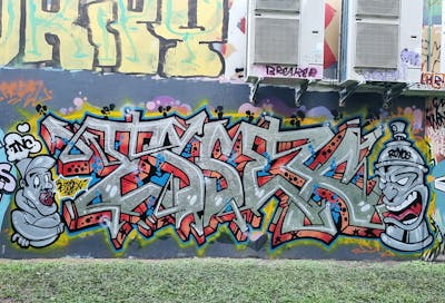 Chrome and Colorful and Orange Stylewriting by ESSEX and TNC. This Graffiti is located in Sunshine Coast, Australia and was created in 2023. This Graffiti can be described as Stylewriting and Characters.