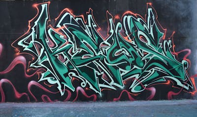 Cyan and Red Stylewriting by Chips and CDSK. This Graffiti is located in London, United Kingdom and was created in 2023. This Graffiti can be described as Stylewriting and Wall of Fame.