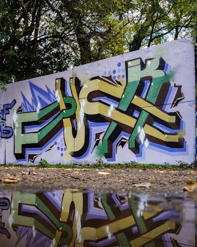 Light Green and Beige and Brown Stylewriting by PUCK. This Graffiti is located in cologne, Germany and was created in 2022. This Graffiti can be described as Stylewriting and Wall of Fame.