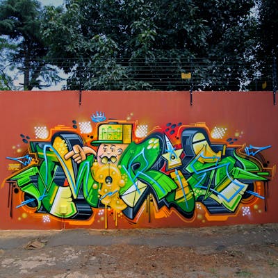 Colorful Stylewriting by Mr. Moris aka Mars. This Graffiti is located in Johannesburg, South Africa and was created in 2021. This Graffiti can be described as Stylewriting, Characters and Wall of Fame.