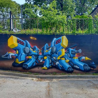 Light Blue and Colorful Stylewriting by Totem and Mister Totem. This Graffiti is located in Atlanta, United States and was created in 2021. This Graffiti can be described as Stylewriting and 3D.
