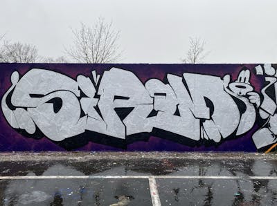 Chrome and Black Stylewriting by Sirom. This Graffiti is located in Oschatz, Germany and was created in 2022. This Graffiti can be described as Stylewriting, Characters and Wall of Fame.