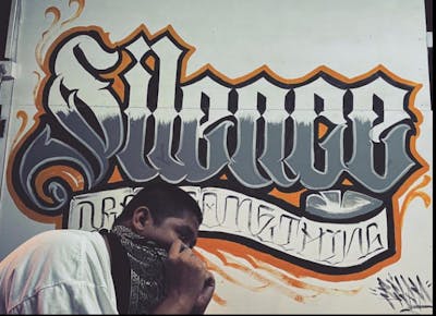 Grey and White and Orange Stylewriting by Billy and bsj. This Graffiti is located in Yangon, Myanmar and was created in 2020. This Graffiti can be described as Stylewriting and Roll Up.