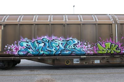 Cyan Stylewriting by Rave, Angel, DCK and ALL CAPS COLLECTIVE. This Graffiti is located in Hungary and was created in 2020. This Graffiti can be described as Stylewriting, Freights and Trains.