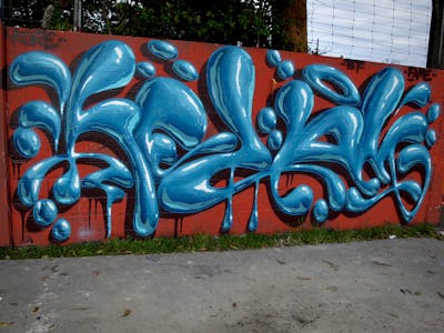 Red and Light Blue Stylewriting by Kezam. This Graffiti is located in Auckland, New Zealand and was created in 2022. This Graffiti can be described as Stylewriting and 3D.