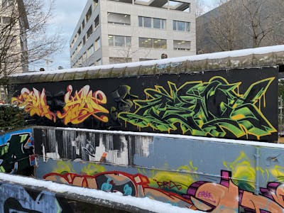 Colorful and Orange Stylewriting by EmzG. This Graffiti is located in Zug, Switzerland and was created in 2022. This Graffiti can be described as Stylewriting, Characters and Wall of Fame.