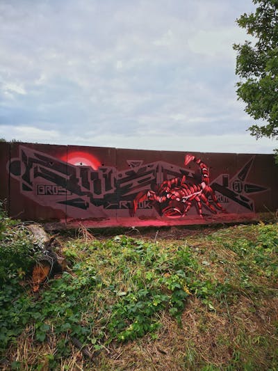 Red Stylewriting by rizok, R120K and bros. This Graffiti is located in Leipzig, Germany and was created in 2021. This Graffiti can be described as Stylewriting, Characters and Wall of Fame.