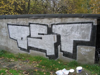 Chrome and Black Stylewriting by urine and OST. This Graffiti is located in Delitzsch, Germany and was created in 2008. This Graffiti can be described as Stylewriting and Street Bombing.