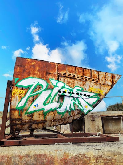 Green and White Stylewriting by Riots. This Graffiti is located in Malta and was created in 2023. This Graffiti can be described as Stylewriting, Abandoned and Atmosphere.