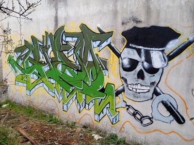 Green and Light Green and Grey Characters by Gizmo. This Graffiti is located in Thessaloniki, Greece and was created in 2022. This Graffiti can be described as Characters and Abandoned.