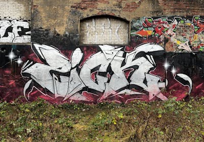 Chrome and Black and Red Stylewriting by ZICK and PMZ CREW. This Graffiti is located in Oldenburg, Germany and was created in 2023. This Graffiti can be described as Stylewriting and Abandoned.