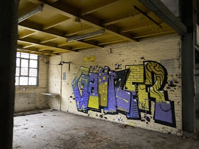 Violet and Beige Stylewriting by Gauner. This Graffiti is located in Belgium and was created in 2023. This Graffiti can be described as Stylewriting and Abandoned.