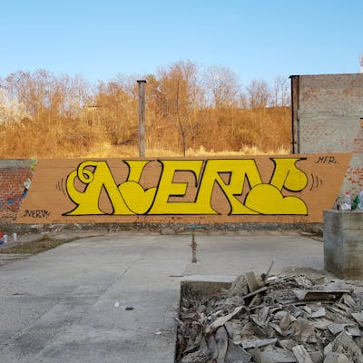 Yellow and Black Stylewriting by Nerv. This Graffiti is located in Novi Sad, Serbia and was created in 2022. This Graffiti can be described as Stylewriting and Abandoned.