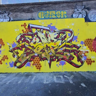 Red and Violet and Yellow Stylewriting by SAO2971. This Graffiti is located in St helier, Jersey and was created in 2023.
