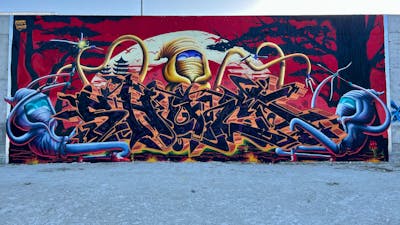Colorful and Red and Black Stylewriting by Shacky and Umko. This Graffiti is located in Lemesos, Cyprus and was created in 2023. This Graffiti can be described as Stylewriting, Characters, Streetart and Murals.