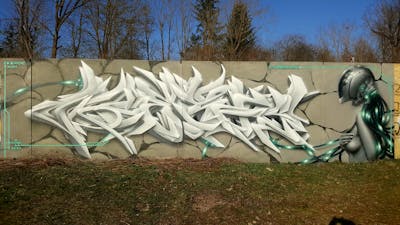 Grey and Cyan Stylewriting by Zeroc67, Blockpost Crew and HoodVibes Family. This Graffiti is located in Meiningen, Germany and was created in 2021. This Graffiti can be described as Stylewriting, Characters and 3D.