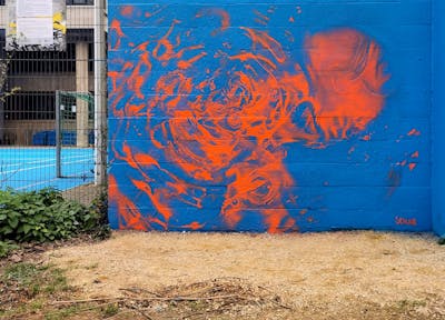 Orange and Light Blue Streetart by Sokar. This Graffiti is located in Belgium and was created in 2024.