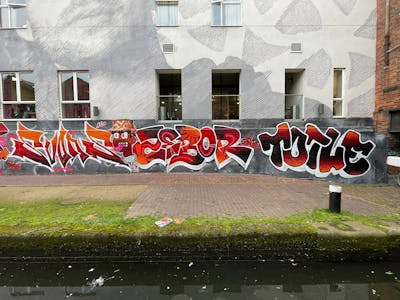 Red and White and Grey Stylewriting by Zebor, Char, smo__crew and Toile. This Graffiti is located in Wolverhampton, United Kingdom and was created in 2022. This Graffiti can be described as Stylewriting, Characters and Wall of Fame.