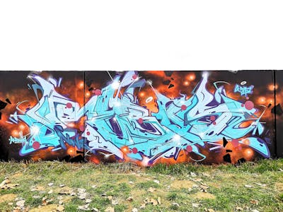 Cyan and Orange and Colorful Stylewriting by Rebus. This Graffiti is located in OSIJEK, Croatia and was created in 2024.