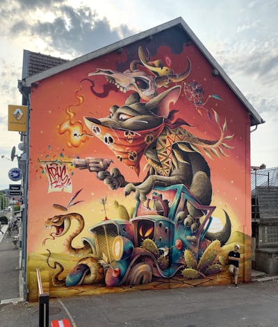 Colorful Characters by Abys. This Graffiti is located in Longlaville, France and was created in 2022. This Graffiti can be described as Characters, Murals, Streetart and Commission.