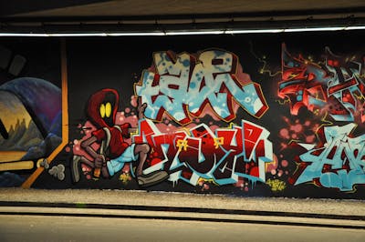 Light Blue and Red and Colorful Stylewriting by HAMPI and TALE. This Graffiti is located in bochum, Germany and was created in 2023. This Graffiti can be described as Stylewriting, Characters, Wall of Fame and Murals.